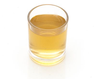 Glass with Chun Mee liquor